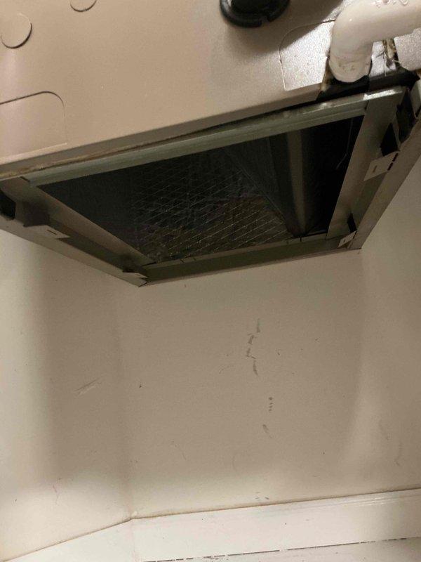 Completed warranty inspection of rooftop HVAC installation. Confirmed that inline dryer was not installed as part of original equipment setup. Documented existing multi-unit configuration including Lennox condenser and additional HVAC equipment, all properly mounted on ballasted roofing system with appropriate electrical disconnects and conduit connections in place.