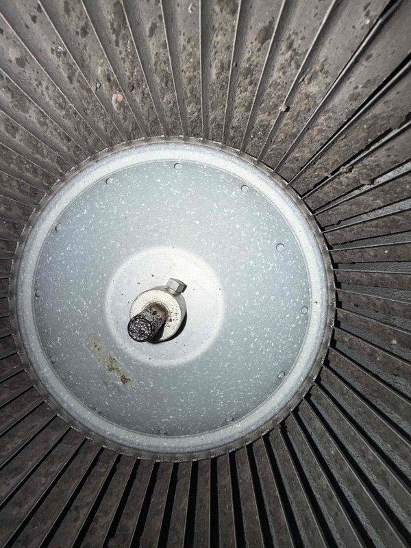Completed Gold Comfort Plan Clean and Check service on air conditioning system and air handler. Performed comprehensive inspection of blower assembly, noting dust accumulation on fan blades and motor hub. Evaluated air filter condition using digital measuring instrument, recording temperature differential of 76.4°F across filter media. Filter showed moderate dust loading with visible discoloration on pleated MERV-rated media. Verified proper airflow and system operation throughout inspection process.