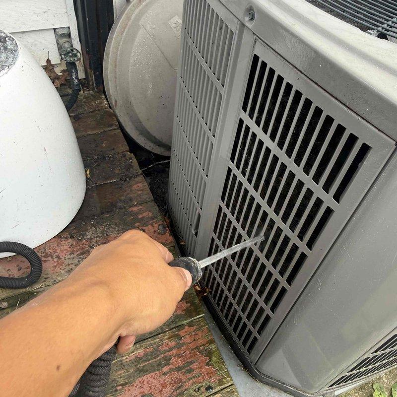 Responded to no-cooling call on American Standard air conditioning system. Upon arrival, performed diagnostic testing and measured electrical readings using clamp meter to verify system operation. Inspected outdoor condensing unit, checked electrical components including capacitor as suspected by homeowner, and assessed overall system performance to determine cause of malfunction and provide repair options.