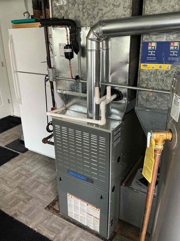 Returned to site to complete HVAC installation consisting of American Standard furnace system with new A/C coil integration. Finalized all ductwork connections, confirmed proper refrigerant line routing with copper piping and shutoff valve installation, and verified condensate drainage system with white PVC piping. Completed Nest smart thermostat wiring and configuration, connecting all necessary terminals (Y1, Y2, G, O/B, RC, W1, W2/AUX, C, RH) and ensuring level installation. Performed system startup, tested heating and cooling operation, verified airflow through all zones, and confirmed thermostat communication with HVAC equipment. Collected remaining balance and provided homeowner with system operation overview.