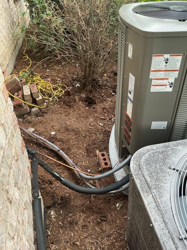 Completed full HVAC system replacement on first floor, including removal of existing equipment and installation of new Lennox air conditioning unit and furnace. Installed humidifier as part of the system upgrade. New outdoor condenser unit positioned on pad against exterior brick wall with proper refrigerant line routing and electrical connections completed. All equipment tested and verified operational upon completion.
