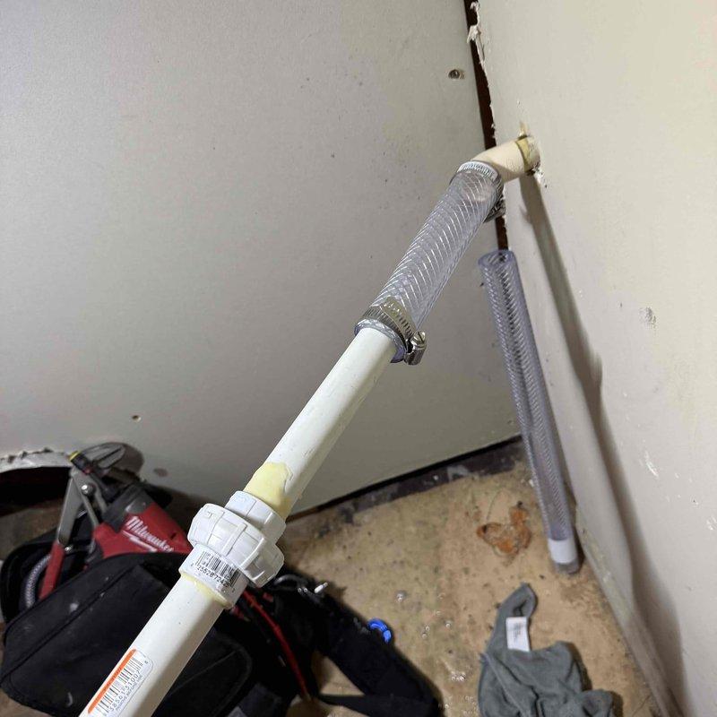 Responded to service call for humidifier leak. Upon inspection, identified water leakage at humidifier supply line connection. Replaced defective braided supply hose and PVC feed line assembly with new components, secured all connections with proper metal clamp fittings, and verified system for proper water flow and leak-free operation.