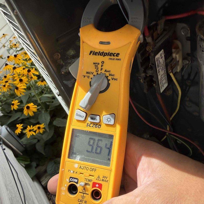 Completed tune-up maintenance on a 2003-2004 residential air conditioning system for a new customer. Performed standard diagnostics including amperage readings on the condensing unit, which measured 96.1 amps during testing, and conducted comprehensive system inspection under mostly cloudy conditions with ambient temperature of 76°F.