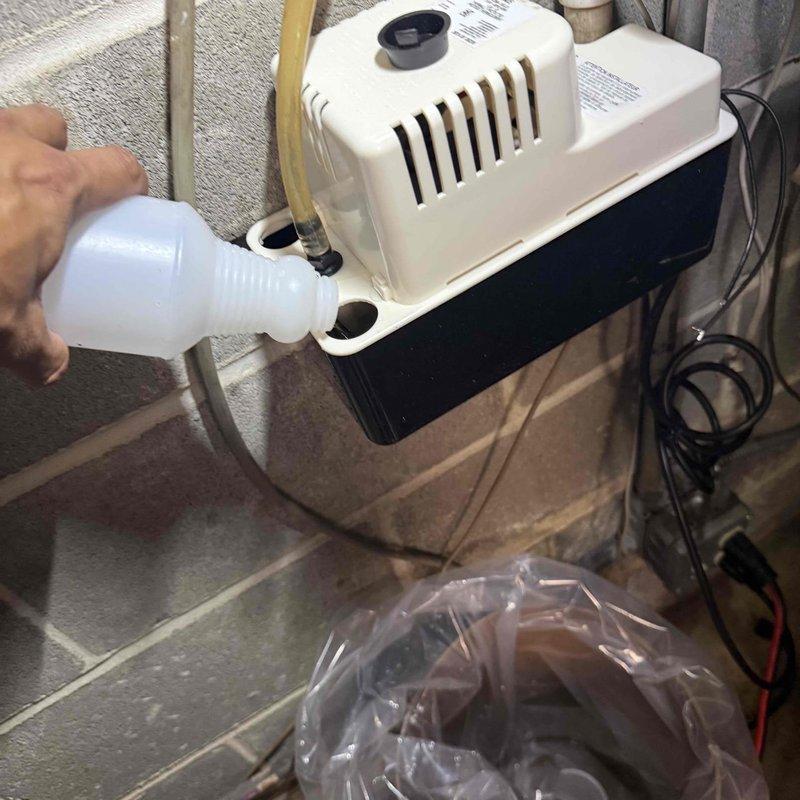 Responded to water leak around furnace in commercial HVAC system. Inspected and serviced condensate pump, added cleaning solution to reservoir, and verified proper drainage function. Tested system operation and confirmed condensate removal working correctly, eliminating water accumulation issue.