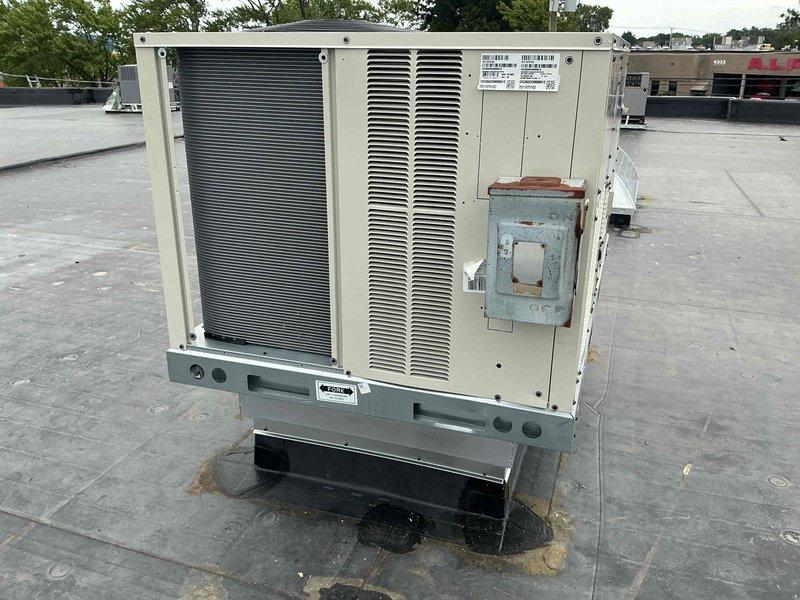 Completed full replacement of a 5-ton rooftop unit serving the rear section of a commercial facility. Disconnected and removed the existing RTU using crane lift services, then installed a new 5-ton unit in the same rooftop location. Reconnected unit to existing electrical service, performed complete startup procedures, conducted operational testing, and made all necessary final adjustments to ensure proper system performance. Unit is operational with standard warranty coverage on parts, labor, and compressor components.