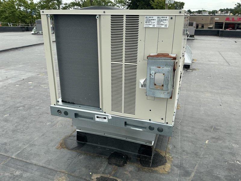 Completed full replacement of a 5-ton rooftop unit serving the rear section of a commercial facility. Disconnected and removed the existing RTU using crane lift services, then installed a new 5-ton unit in the same rooftop location. Reconnected unit to existing electrical service, performed complete startup procedures, conducted operational testing, and made all necessary final adjustments to ensure proper system performance. Unit is operational with standard warranty coverage on parts, labor, and compressor components.