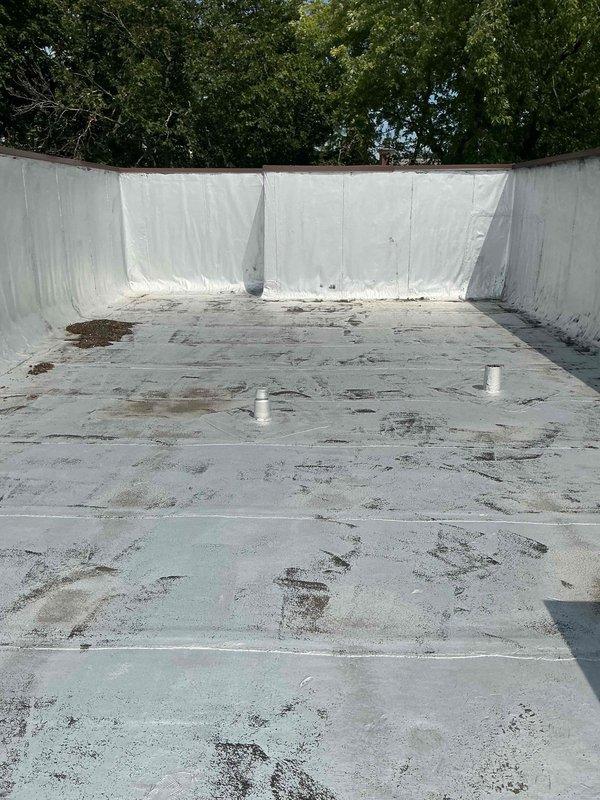 Conducted comprehensive site assessment for rooftop unit replacement on commercial flat roof installation. Documented existing RTU location, captured data plate information, recorded critical measurements, and photographed roof conditions including membrane weathering, parapet walls, and ventilation penetrations to facilitate accurate equipment specifications and replacement planning.