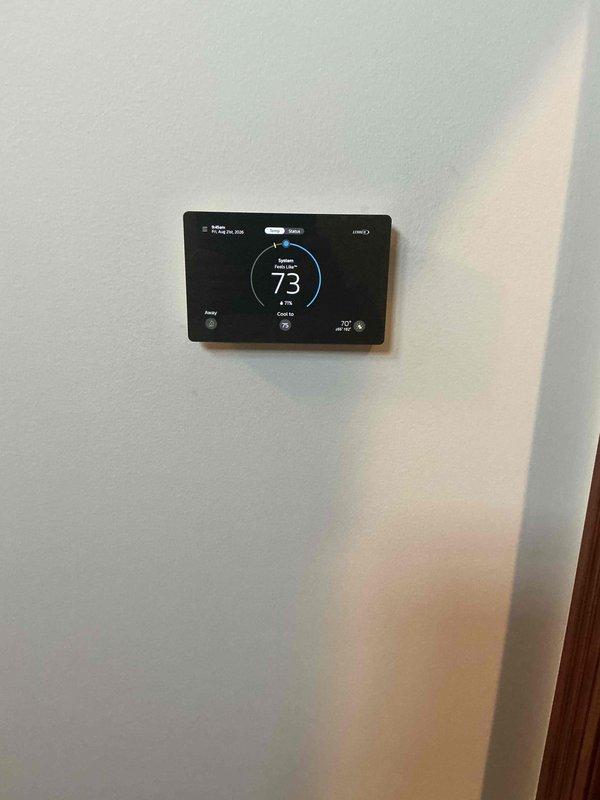 Responded to warranty callback for persistent high humidity readings on digital thermostat. Accessed thermostat settings menu and verified configuration parameters including Auto Dehumidification Overcooling Threshold set at 4.0%, Humidity Deadband at 5.0%, and confirmed communicating equipment connections. Replaced thermostat per previous technician recommendation after software update did not resolve ongoing humidity control issue.