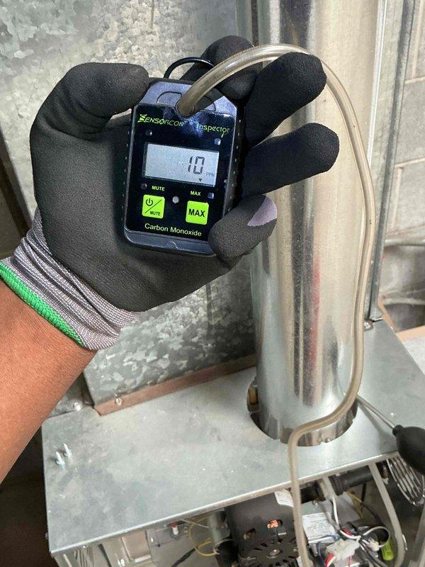 Completed fall maintenance on commercial HVAC system including full furnace inspection and operational testing of all components. Performed combustion analysis with CO testing showing safe levels at 10 PPM, inspected burner assembly, heat exchanger, blower motor, gas valve, and all electrical connections. Verified heating and cooling systems operational and ready for tenant occupancy, with unit responding properly to thermostat commands and all safety controls functioning as designed.