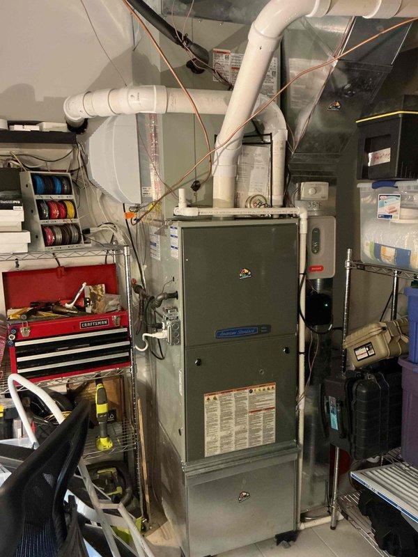 Completed full HVAC system replacement including reclamation of existing refrigerant from condenser, evaporator coil, and line-set, followed by disconnection and proper disposal of old equipment. Installed new Lennox 4-ton 18 SEER2 variable-speed air conditioning condensing unit (Model EL18KCV-048-230) on leveled pad with pea gravel, along with matching evaporator coil connected to existing copper refrigerant lines. System was evacuated to remove moisture and air, then charged with R454B refrigerant to manufacturer specifications. Installed Refrigerant Detection System (RDS) per current code requirements. Performed complete system start-up, operational testing, and safety inspection to verify proper function of all components.