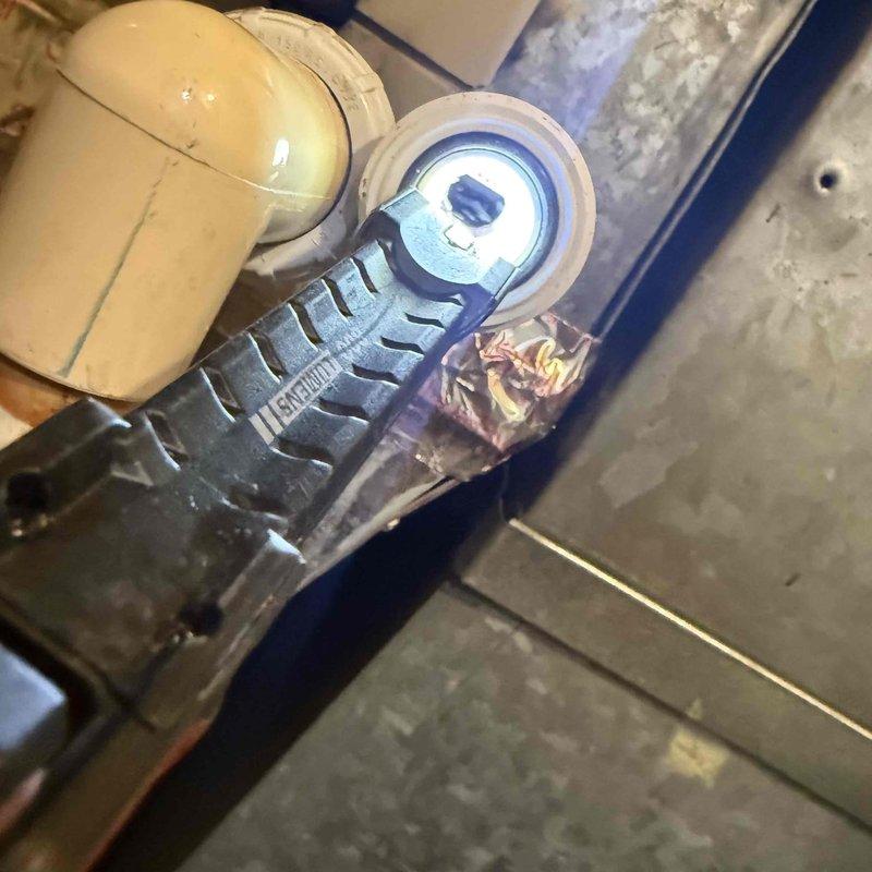 Responded to water leak in furnace room and identified source as failed condensate pump motor with visible thermal damage to housing and wiring. Documented equipment condition with thermal imaging and photographs showing heat-related component failure on GENERAL brand pump assembly. Recommended immediate pump replacement to prevent further water damage and restore proper condensate drainage from HVAC system.