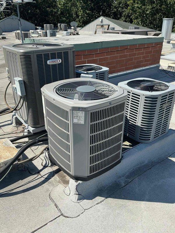 Responded to no-cooling complaint at condo unit following customer's return from vacation. Inspected rooftop HVAC system including multiple condenser units, with primary focus on Lennox unit serving the affected space. Evaluated air handler components and found filter media showing signs of dust accumulation and reduced airflow capacity. Documented equipment conditions and system operation through diagnostic assessment. Verified electrical connections, refrigerant circuit integrity, and airflow pathways across all accessible components.