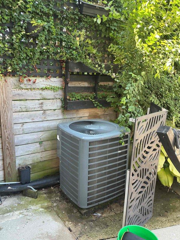 Responded to no cooling complaint on first floor of rental property. Upon inspection, found outdoor condenser unit operational but evaporator coil heavily contaminated with mold, mildew, and debris buildup restricting airflow. Documented equipment condition with photos showing significant biological growth on coil fins affecting system performance. Performed diagnostic evaluation, recorded all equipment information, and presented flat rate repair options including coil cleaning to restore proper air conditioning function.