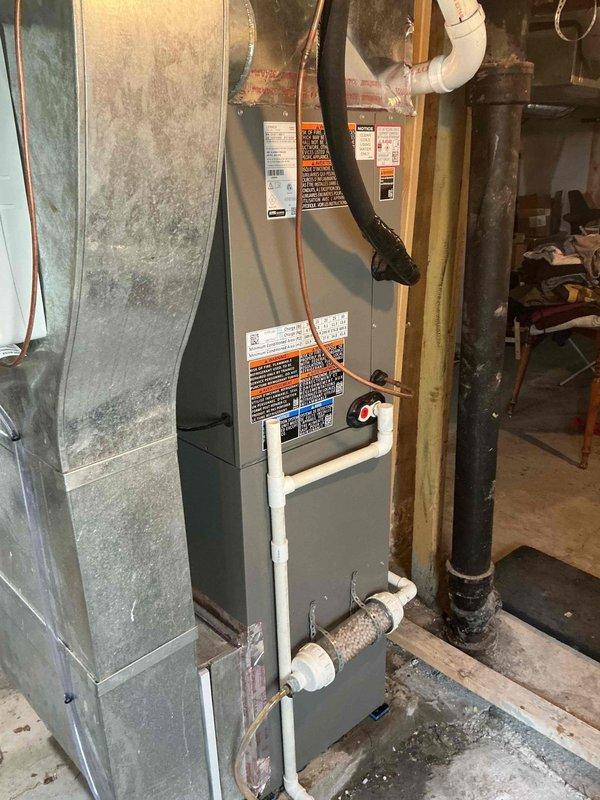 Completed full HVAC system replacement including removal and disposal of existing forced air furnace and air conditioning condenser with coil. Installed new Lennox SLP99UH070XV36BK 99% efficiency 66,000 BTU gas furnace (Cat #26J92) in basement location, connecting to existing supply and return ductwork with necessary sheet metal transitions, gas line, electrical circuit, and exhaust system. Reclaimed refrigerant from old system and installed new Lennox EL18KSLV-036 3-ton 18 SEER2 heat pump unit (Cat #28V26) in outdoor location per specific directional requirements, along with new evaporator coil. Connected heat pump to existing copper refrigerant line-set, evacuated system to remove moisture and air, and charged with R454B refrigerant. Performed complete start-up procedures, operational testing, system adjustments, and safety inspections on all equipment to verify proper performance. System includes 12-year parts warranty and 12-year extended labor agreement.