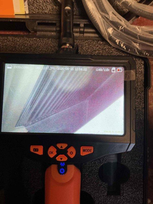 Completed fall preventive maintenance inspection per Platinum Comfort Plan on residential furnace system. Performed comprehensive clean and check procedures including visual inspection of all accessible components, burner assembly cleaning, heat exchanger examination using borescope camera, filter replacement, and operational testing. During borescope inspection, identified and documented significant frost and ice accumulation on evaporator coil, indicating potential refrigerant charge issue or airflow restriction requiring further diagnostic evaluation. System operational at time of departure with recommendations provided for follow-up service to address icing condition.