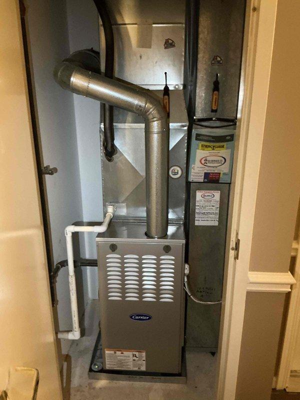 Completed scheduled Comfort Plan maintenance on rooftop Carrier HVAC system. Performed comprehensive clean and check service including filter replacement, system inspection, and operational testing. Unit accessed via building-provided ladder, invoice processed per service contract agreement.