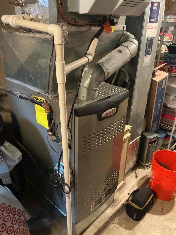 Completed Silver Comfort Plan Clean and Check service on residential split system air conditioning unit. Performed comprehensive inspection of outdoor condensing unit and indoor Lennox furnace with cooling coil, verified proper system operation, cleaned components as needed, and collected payment for annual plan renewal.