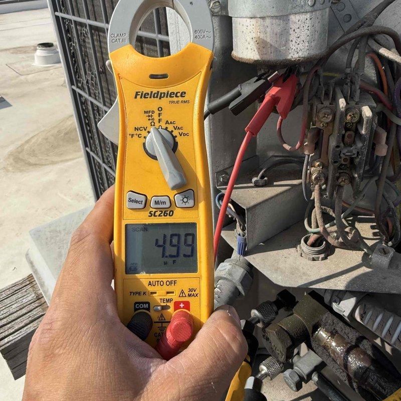 Completed comprehensive clean and check maintenance on multiple HVAC systems including two split AC systems, two furnaces, and one hanging heater. Performed electrical diagnostics using clamp meter, verified amperage readings at 499 on outdoor condensing unit, and conducted temperature differential measurements across system components. Installed 16x20x1 filter as specified, inspected all equipment for proper operation, and confirmed all systems operating within normal parameters with no immediate repairs required at time of service.
