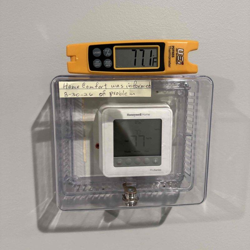Responded to follow-up no cooling complaint on commercial HVAC unit. Previous technician had addressed clogged filters, but cooling issue persisted. Upon arrival, verified thermostat settings at 71°F while ambient temperature measured 77.1°F, confirming inadequate cooling performance. Measured supply air temperature at return grille registering 53.6°F. Documented thermostat configuration with lockbox protection and existing probe notation. Coordinated with office regarding continuation of diagnostic work and approval process for additional service time required to complete troubleshooting and repairs.