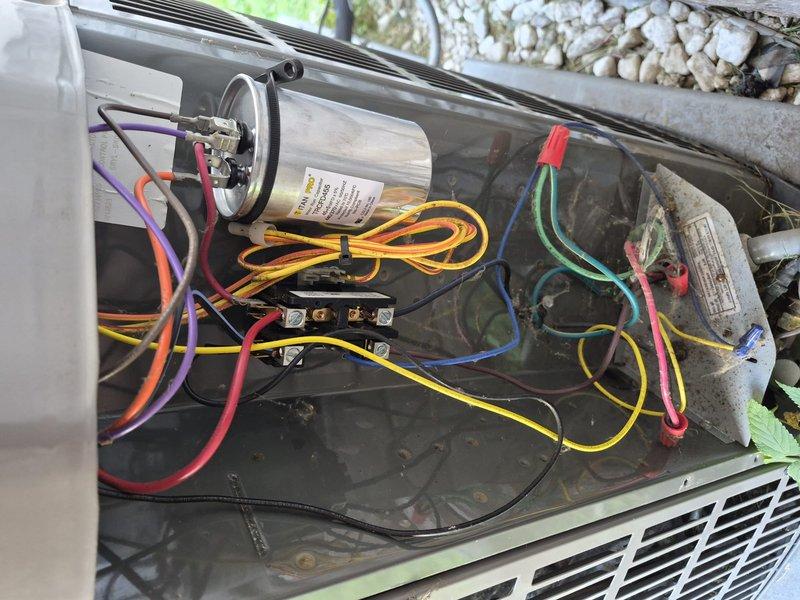 Responded to no cooling call for upstairs air conditioning system affecting entire home. Unit is approximately four years old and was originally installed by our company in 2022. Upon arrival, accessed outdoor condensing unit electrical compartment and performed diagnostic testing. Utilized digital multimeter to test electrical components and confirmed capacitor failure. Replaced defective dual run capacitor, verified proper voltage readings, and tested system operation. Unit restored to normal cooling operation with all electrical connections secured and compartment properly closed.