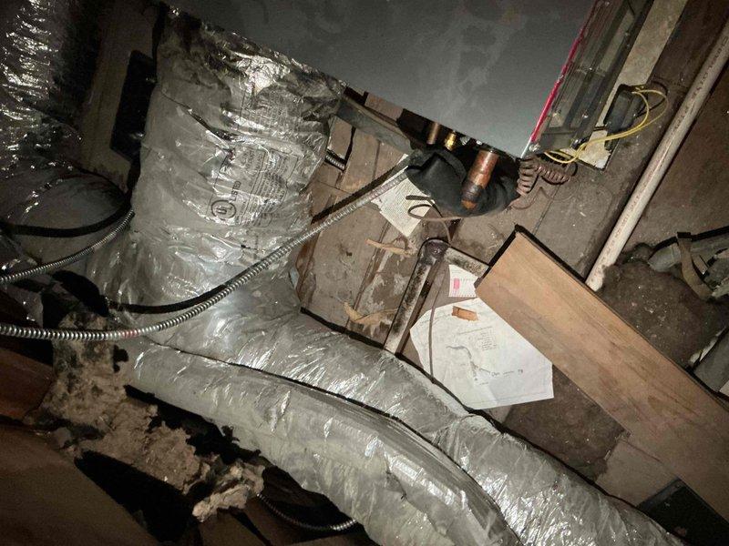 Responded to no cooling complaint on residential air conditioning system. Upon arrival, verified thermostat settings and confirmed unit was not operating properly. Performed comprehensive diagnostic evaluation of outdoor condensing unit. Inspected electrical components including capacitor, contactor, and wiring connections. Tested compressor operation and found compressor failed to engage. Checked refrigerant service ports and system pressures. Evaluated overall system condition and noted age of equipment. Reviewed findings with customer regarding compressor failure and discussed repair versus replacement options based on unit age and cost-effectiveness. Documented equipment information and captured photos of mechanical space and internal unit components for service records.