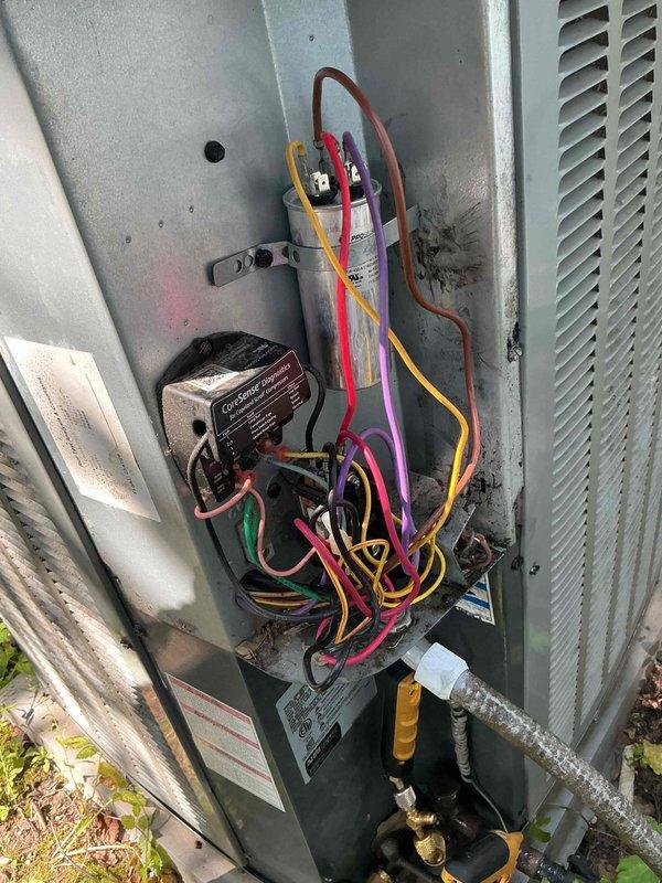 Responded to no cooling complaint on residential air conditioning system. Upon arrival, verified thermostat settings and confirmed unit was not operating properly. Performed comprehensive diagnostic evaluation of outdoor condensing unit. Inspected electrical components including capacitor, contactor, and wiring connections. Tested compressor operation and found compressor failed to engage. Checked refrigerant service ports and system pressures. Evaluated overall system condition and noted age of equipment. Reviewed findings with customer regarding compressor failure and discussed repair versus replacement options based on unit age and cost-effectiveness. Documented equipment information and captured photos of mechanical space and internal unit components for service records.