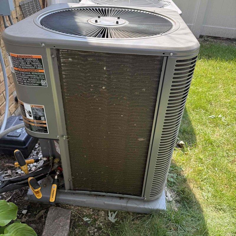 Performed warranty follow-up inspection on recently installed AC system to assess refrigerant levels as previously recommended. Conducted temperature differential measurements at thermostat location and inspected outdoor condenser unit with attached manifold gauges. Customer declined preventative maintenance at this time due to concerns about potential system issues requiring repair attention.