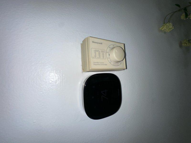 Completed cosmetic touch-up work around newly installed Ecobee smart thermostat. Applied paint to wall surface surrounding the thermostat installation area to provide finished appearance and match existing wall color. Work performed as part of installation completion at no additional charge to customer.