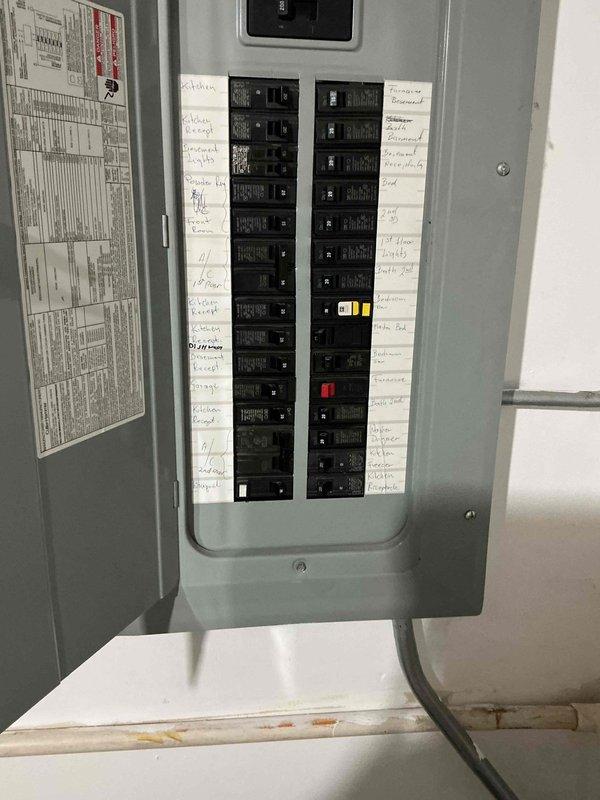 Responded to no-cooling complaint on second floor system. Upon arrival, performed diagnostic evaluation of 19-year-old air conditioning unit. Inspected electrical components and verified proper power supply at breaker panel. Documented electrical panel configuration and circuit breaker arrangement for system reference. Evaluated overall system condition and discussed equipment age considerations with homeowner. Provided assessment of repair versus replacement options given the age of the unit and recent service history. Photographed electrical distribution panel for service records.