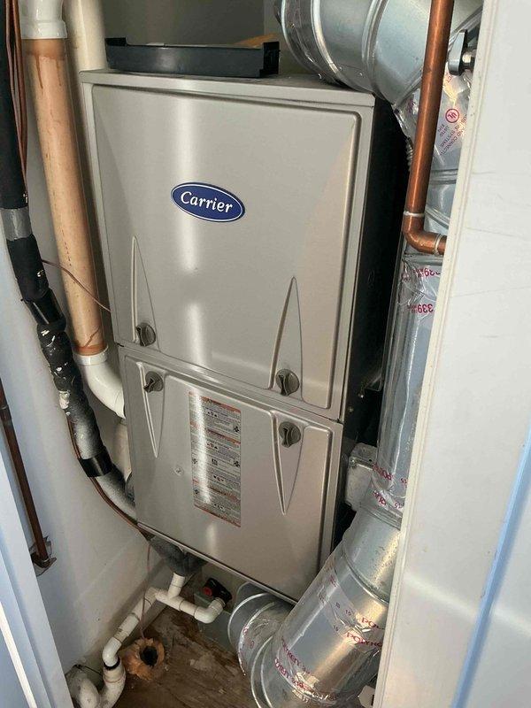 Responded to service call for non-operational air conditioning system with water leakage in basement. Upon inspection, identified active leak from HVAC system requiring attention. Documented existing Carrier furnace installation and associated mechanical components including refrigerant lines, condensate drainage system, and ductwork configuration for estimate preparation. Collected payment as authorized and provided replacement system recommendations to address the identified issues with the current equipment.