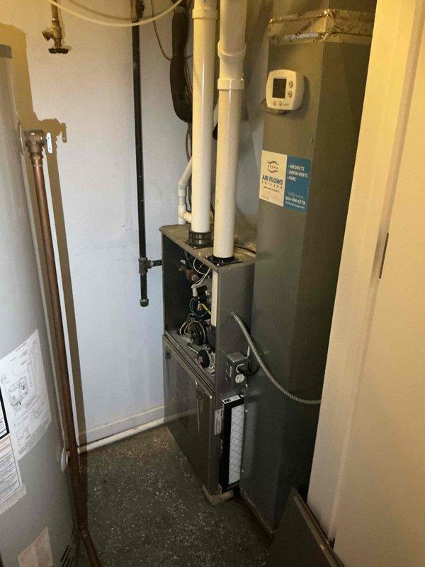 Responded to service call for non-operational air conditioning system with water leakage in basement. Upon inspection, identified active leak from HVAC system requiring attention. Documented existing Carrier furnace installation and associated mechanical components including refrigerant lines, condensate drainage system, and ductwork configuration for estimate preparation. Collected payment as authorized and provided replacement system recommendations to address the identified issues with the current equipment.