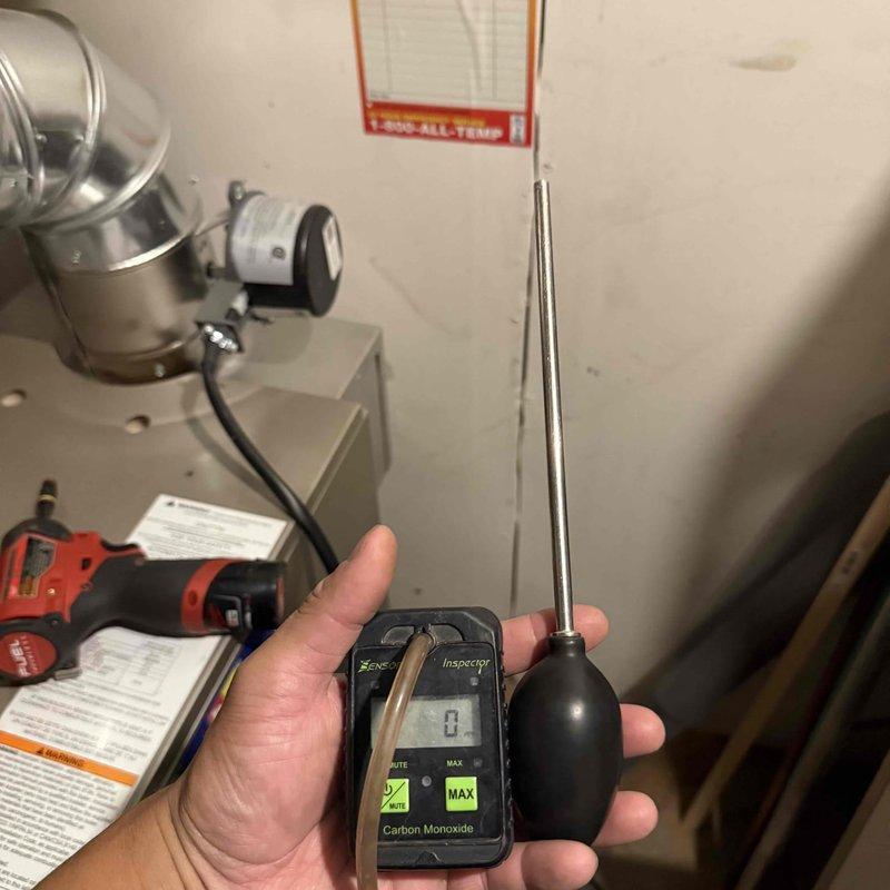 Performed comprehensive clean and check maintenance on boiler and water heater system. Conducted carbon monoxide safety testing throughout the mechanical space with calibrated detector, confirming zero ambient CO levels and safe operation. Inspected and evaluated system pressure and temperature readings using dual-scale gauge, verifying proper operating parameters within manufacturer specifications. Documented equipment conditions with detailed photos for service records.
