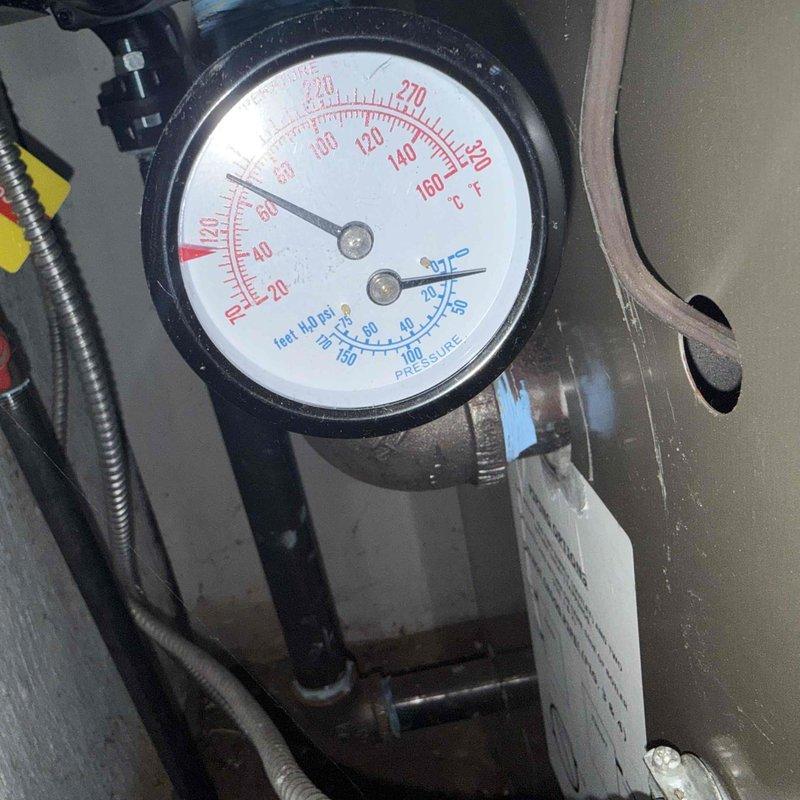 Performed comprehensive clean and check maintenance on boiler and water heater system. Conducted carbon monoxide safety testing throughout the mechanical space with calibrated detector, confirming zero ambient CO levels and safe operation. Inspected and evaluated system pressure and temperature readings using dual-scale gauge, verifying proper operating parameters within manufacturer specifications. Documented equipment conditions with detailed photos for service records.