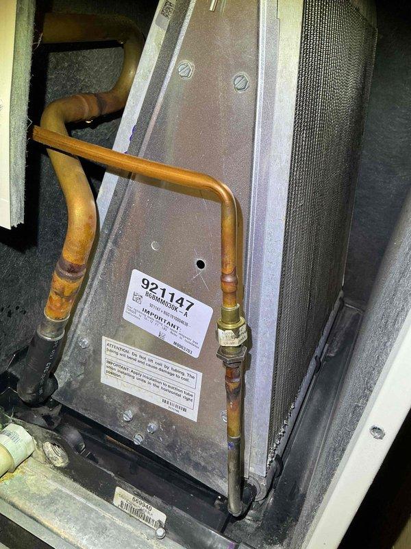 Completed fall maintenance clean and check on air handler system and water heater per Good Comfort Plan protocol. Performed comprehensive inspection of air handler interior components including evaporator coil, condensate drain system, and copper refrigerant lines with brass fittings. Verified proper operation of blower assembly, checked filter condition and airflow, and inspected all electrical connections and safety controls. Conducted water heater clean and check including inspection of burner assembly, venting system, temperature and pressure relief valve, and anode rod condition. Confirmed thermostat operation displaying 76°F setpoint with 40% humidity reading on ecobee smart control unit. All systems operating within normal parameters with no deficiencies noted. Unit tagged and documented for maintenance records.