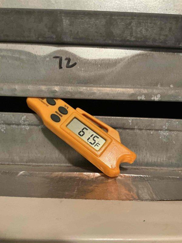 Responded to no cooling complaint on master bedroom heat pump and performed Comfort Plan Clean and Check service on four heat pump systems. Upon inspection, found evaporator coil heavily contaminated with dust, debris, and biological growth affecting airflow and heat transfer efficiency. Supply air temperature measured 61.5°F, confirming reduced cooling capacity. Thoroughly cleaned evaporator coil to remove buildup and restore proper operation. Completed comprehensive maintenance on all four heat pump systems including filter inspection, coil cleaning, refrigerant charge verification, electrical connection testing, and operational performance checks to ensure optimal system efficiency and reliability.