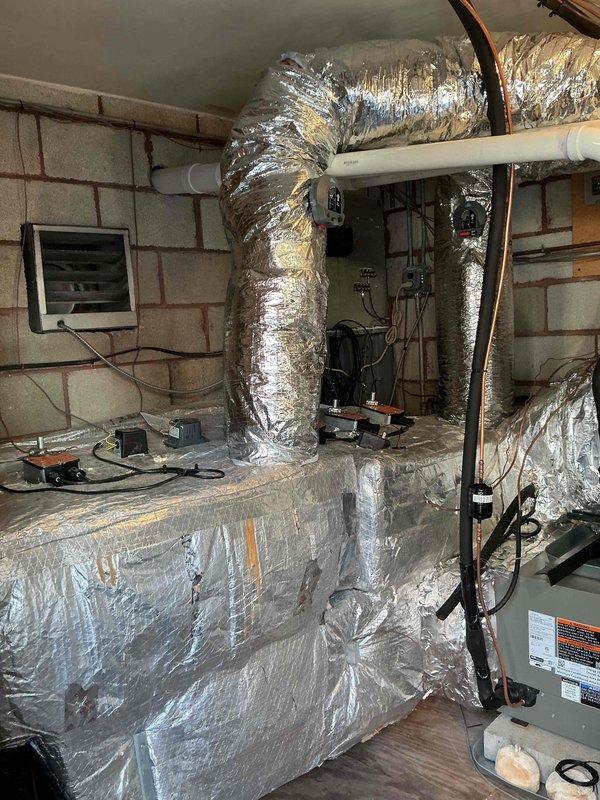 Completed full HVAC system replacement including removal and disposal of existing forced air furnace and air conditioning system. Installed new Lennox 66K BTU modulating variable speed blower furnace (Model SLP99UH070XV36BK3) in attic space, connecting to existing supply and return ductwork with necessary sheet metal transitions, gas line, electrical circuit, and exhaust system. Reclaimed refrigerant from old AC system and installed new Lennox 18 SEER2 3-ton variable speed air conditioning condenser (Model EL18KCV-036-2304) on rooftop in existing location. Removed existing lineset and installed new copper refrigerant lines from rooftop condenser to new evaporator coil inside. Installed new evaporator coil, secondary drain pan for furnace and coil, hockey puck style wet switch, and condensate pump. Evacuated system to remove moisture and air, then charged with R454B refrigerant. Performed complete startup, testing, adjustment, and safety inspection on all equipment to verify proper oper