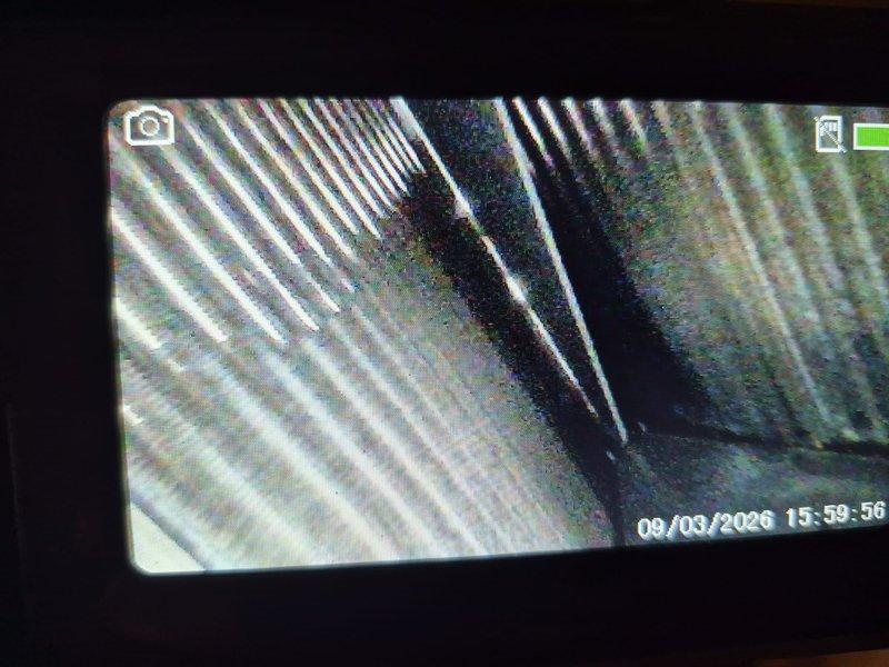 Completed comprehensive clean and check maintenance service on heating system per Comfort Plan agreement. Performed thorough inspection of furnace heat exchanger using borescope camera to verify integrity and identify any cracks or deterioration, with all components found to be in satisfactory operating condition. Conducted standard maintenance procedures including humidifier inspection and water heater evaluation as part of multi-system service visit.