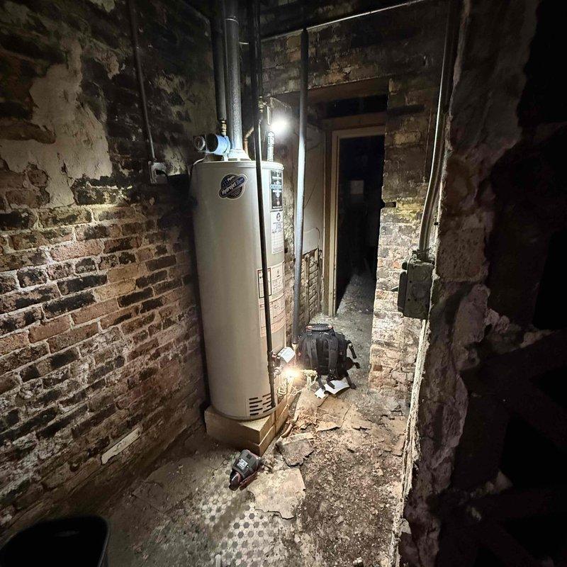 Responded to report of inefficient commercial water heater producing lukewarm water after short periods of use. Upon inspection, identified failed circulator pump with malfunctioning timer control affecting heat distribution throughout the system. Replaced defective circulator pump assembly and timer mechanism, tested unit operation to verify proper water temperature maintenance and adequate hot water recovery time.