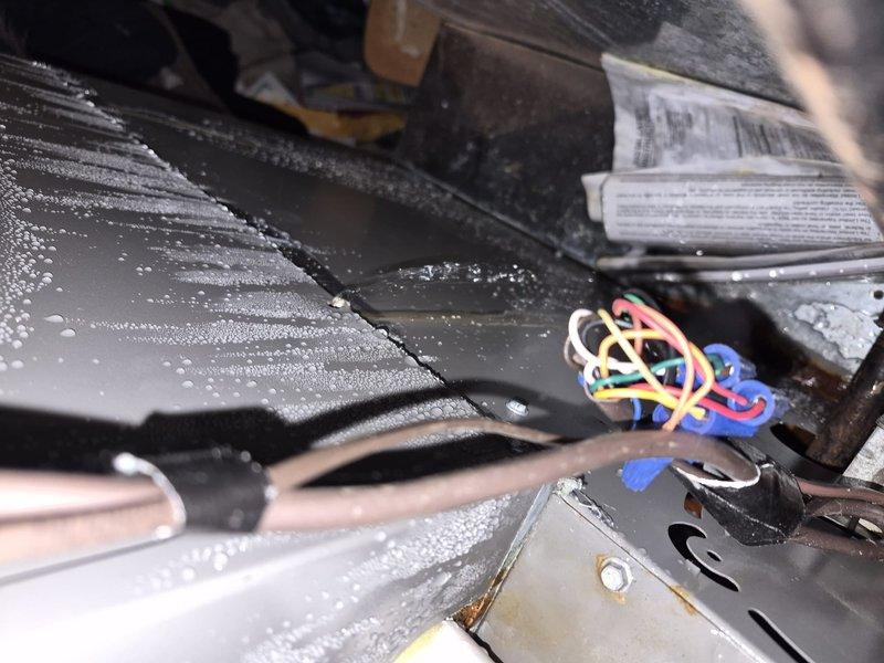 Responded to no cooling complaint on residential air conditioning system. Upon arrival, performed diagnostic evaluation of system operation, thermostat settings, and electrical connections. Inspected evaporator coil assembly and confirmed presence of moisture on coil fins, indicating proper refrigerant flow and system cycling. Verified all electrical connections at air handler were secure and properly terminated. Checked circuit breakers and confirmed power supply to unit. Clarified maintenance history regarding air filter service from previous fall visit, providing photographic documentation showing filter condition at time of last service. Discussed filter replacement protocol and membership coverage details. System found to be operational with no mechanical failures identified.