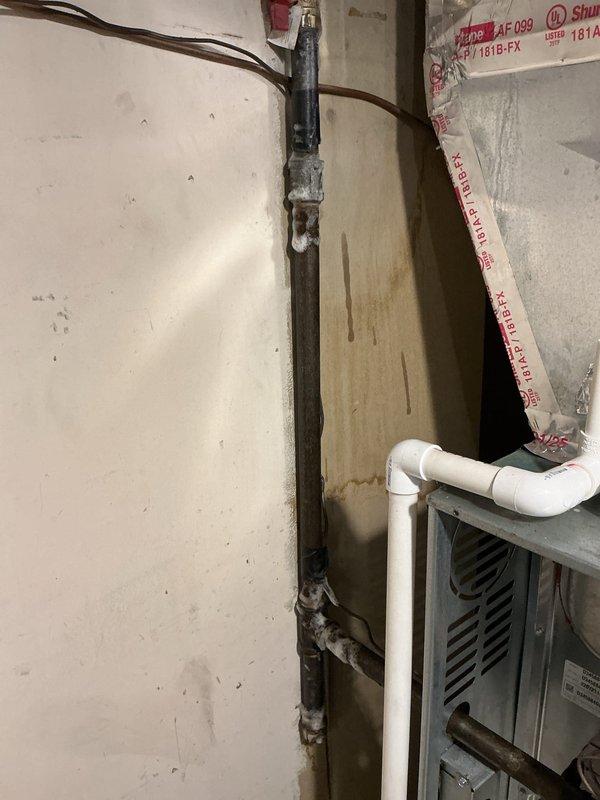 Responded to emergency gas leak at commercial property where utility company had restored service earlier in the day. Accessed unit using lockbox per provided instructions and located furnace with active gas leak at pilot light assembly. Inspected furnace equipment and gas piping system, documented corroded pipe connections and deteriorated valve fittings showing significant rust and mineral deposits. Shut off gas supply to furnace to eliminate immediate safety hazard and prevent further gas leakage until permanent repairs can be completed.