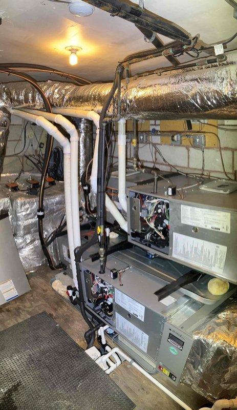 Completed full HVAC system installation including verification of refrigerant charge with superheat and subcooling readings within manufacturer specifications for factory pre-charged units with 30' lineset. Performed operational testing in both cooling and heating modes to confirm proper system function. Wired zone dampers per existing configuration, connected steam humidifier to system controls, and replaced batteries in all thermostats. Installed condensate pan treatment tablet and verified proper drainage. System commissioned and left in operational status with all components functioning as designed.