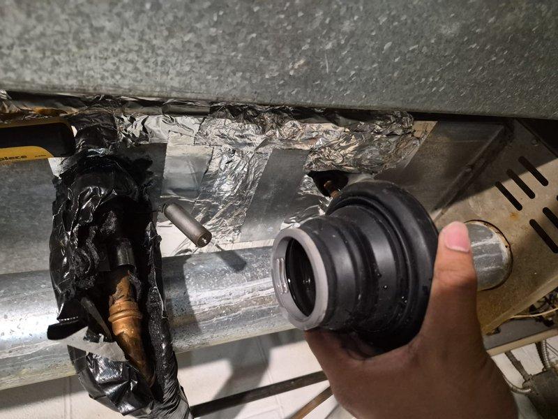 Responded to follow-up service call for front office AC unit where previous technician completed repairs but identified low refrigerant levels. Checked system pressures and confirmed unit required additional R-410A refrigerant charge. Inspected rubber line set grommets and seals during pressure verification, noting wear on boot components. Added refrigerant to manufacturer specifications and verified accurate operating pressures to restore proper cooling performance.
