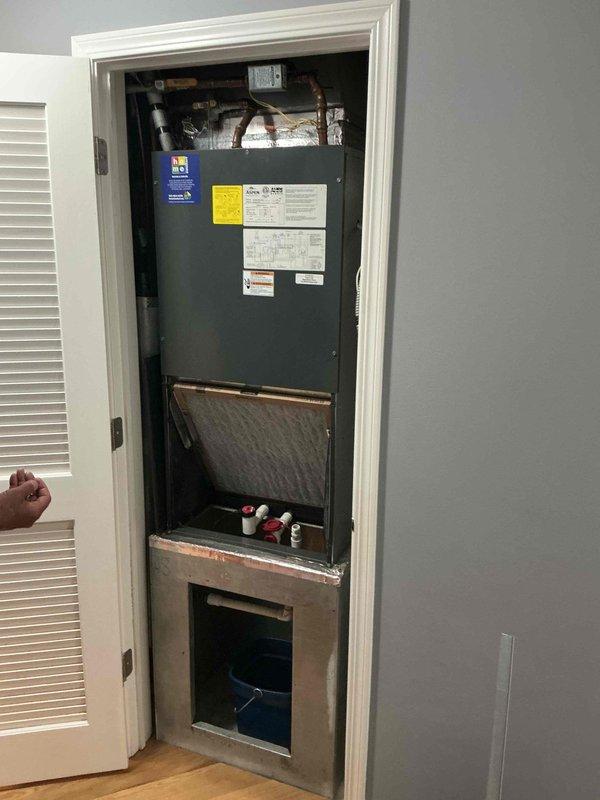 Responded to warranty callback for recurring leak at filter area of air handler unit. Inspected filter housing, evaporator coil section, and drain pan assembly. Documented existing conditions with photos showing internal components and coil assembly. No charge service completed per office authorization.
