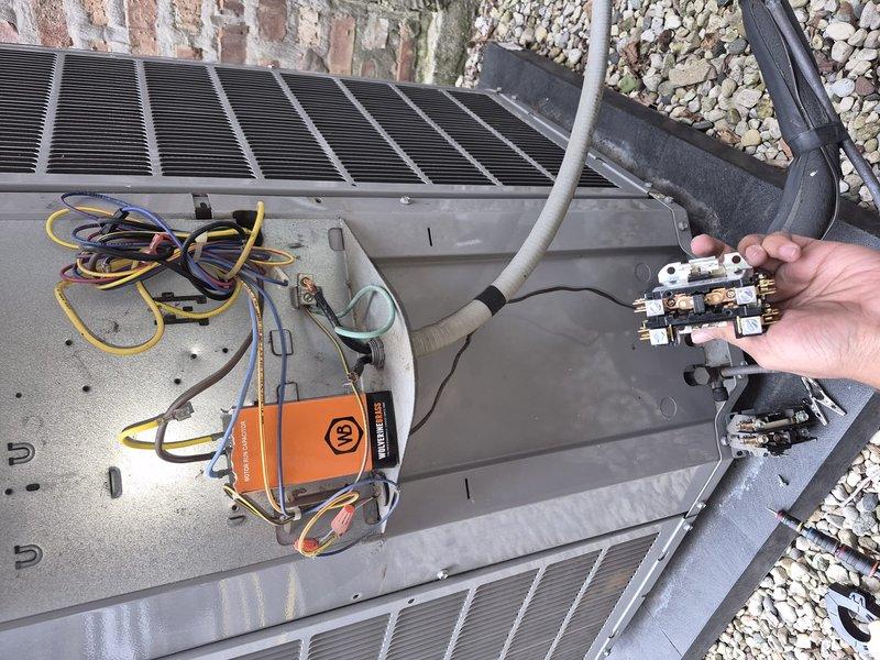 Responded to service call for non-operational air conditioning system. Upon inspection of the 3-year-old outdoor condensing unit, diagnosed failed contactor preventing compressor and condenser fan operation. Replaced defective contactor with new component, verified all electrical connections were secure at terminal block, and tested capacitor functionality. System restored to full operational status with proper cooling cycle confirmed.