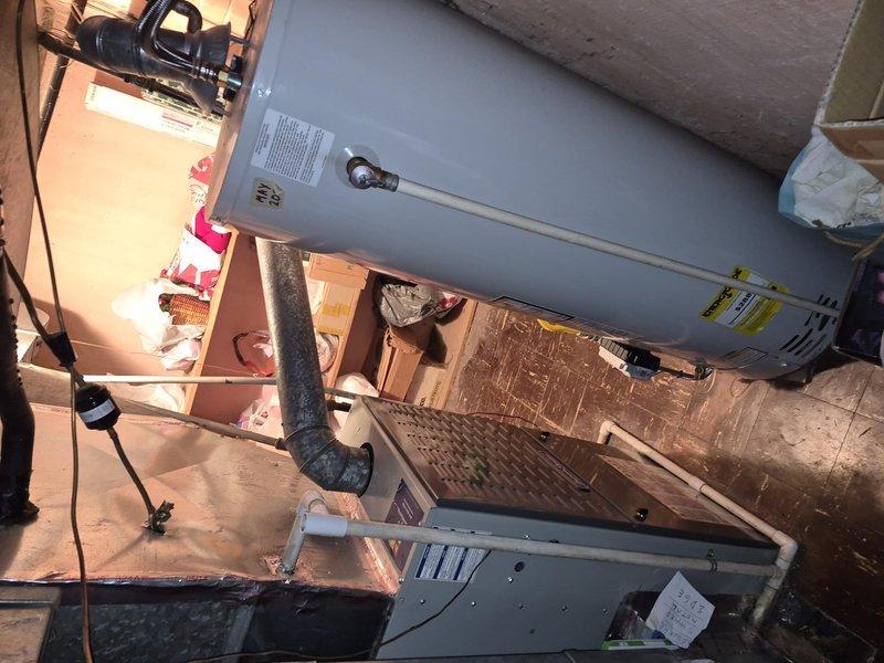 Responded to no-cool call on 12-year-old residential central air conditioning system affecting entire home. Upon arrival, performed diagnostic inspection of outdoor condensing unit and indoor air handler located in attic space. Tested electrical connections, verified power supply to unit, and checked capacitor function. Inspected refrigerant lines, coil condition, and ductwork connections. Documented system configuration with photos showing air handler installation, filter access, and mechanical components. Communicated findings with customer and provided recommendations for restoring cooling operation to the aging system.