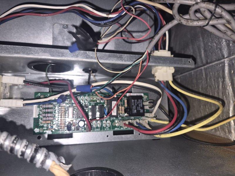 Responded to service call for AC fan running continuously even when system was turned off. Inspected 10-year-old air conditioning system with outdoor condenser unit and attic-mounted furnace. Upon examination of the air handler control board and wiring connections, diagnosed faulty relay on the control board causing continuous fan operation. Verified capacitor connections and blower motor assembly were intact. Replaced defective control board with new unit, reconnected all wire harnesses including power, blower motor, and thermostat connections. Cycled system through multiple on/off sequences to confirm proper relay operation and verify fan now shuts off correctly with thermostat. System operating as designed with no further issues noted.
