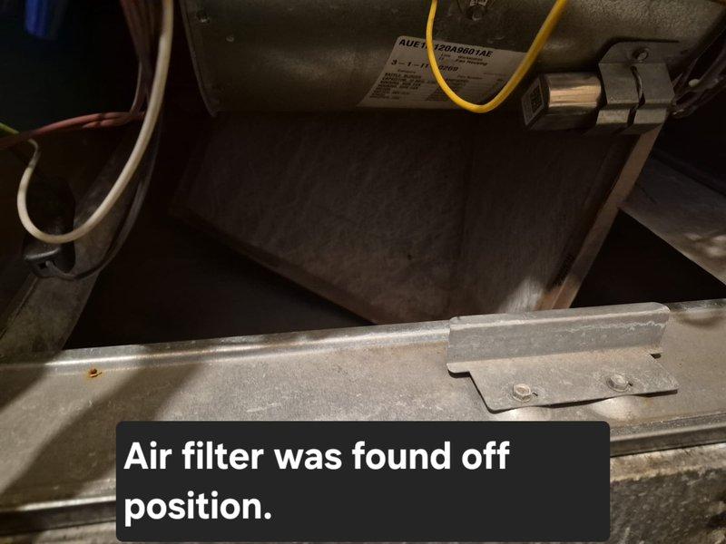 Responded to no cooling complaint for suite 1503 in multi-tenant office space. Upon inspection, discovered air filter had become dislodged from its proper position within the air handler unit, restricting airflow to the blower assembly. Repositioned air filter correctly in the filter track and verified secure placement. Tested system operation and confirmed unit returned to normal cooling function with proper airflow restored.