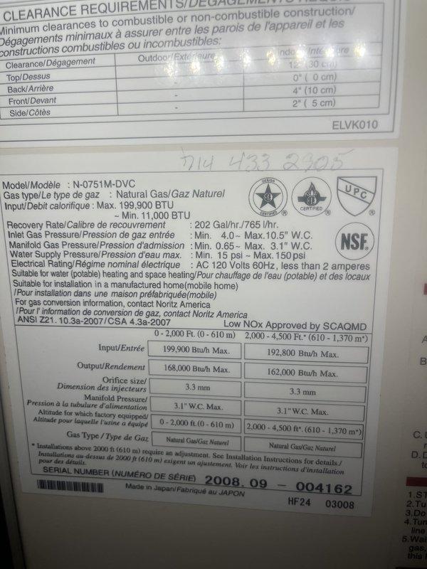 Performed comprehensive inspection and maintenance on tankless water heater unit, Model N-0751M-DVC. Completed flush and cleaning procedure to address suspected sediment buildup affecting water pressure and system performance. Documented existing unit condition including significant staining and potential water damage in installation area, and advised customer that replacement may be necessary based on findings and system age.