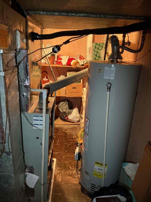 Replaced defective blower motor on HVAC air handler unit located in basement utility area. Collected final payment balance for completed repair work, with credit card processing fee applied as applicable.