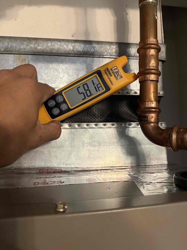 Returned to property with leak detection equipment to investigate potential refrigerant leak in HVAC system. Upon arrival, checked system pressures which were operating within normal parameters, consistent with previous visit findings. Utilized electronic leak detector (sniffer) to scan refrigerant lines, joints, and connections throughout the system but was unable to locate any active leaks at time of inspection.

Measured supply line temperature at 58°F and return air temperature at 74°F using calibrated digital thermometer. Temperature differential indicates system is currently operating properly with adequate refrigerant charge. Thoroughly inspected copper line set connections, evaporator coil access points, and condenser unit for signs of refrigerant loss. All accessible joints and fittings showed no evidence of active leaking at time of service call.

Previous leak sealant application appears to have successfully sealed the leak, as system pressures remain stable and no refrigera